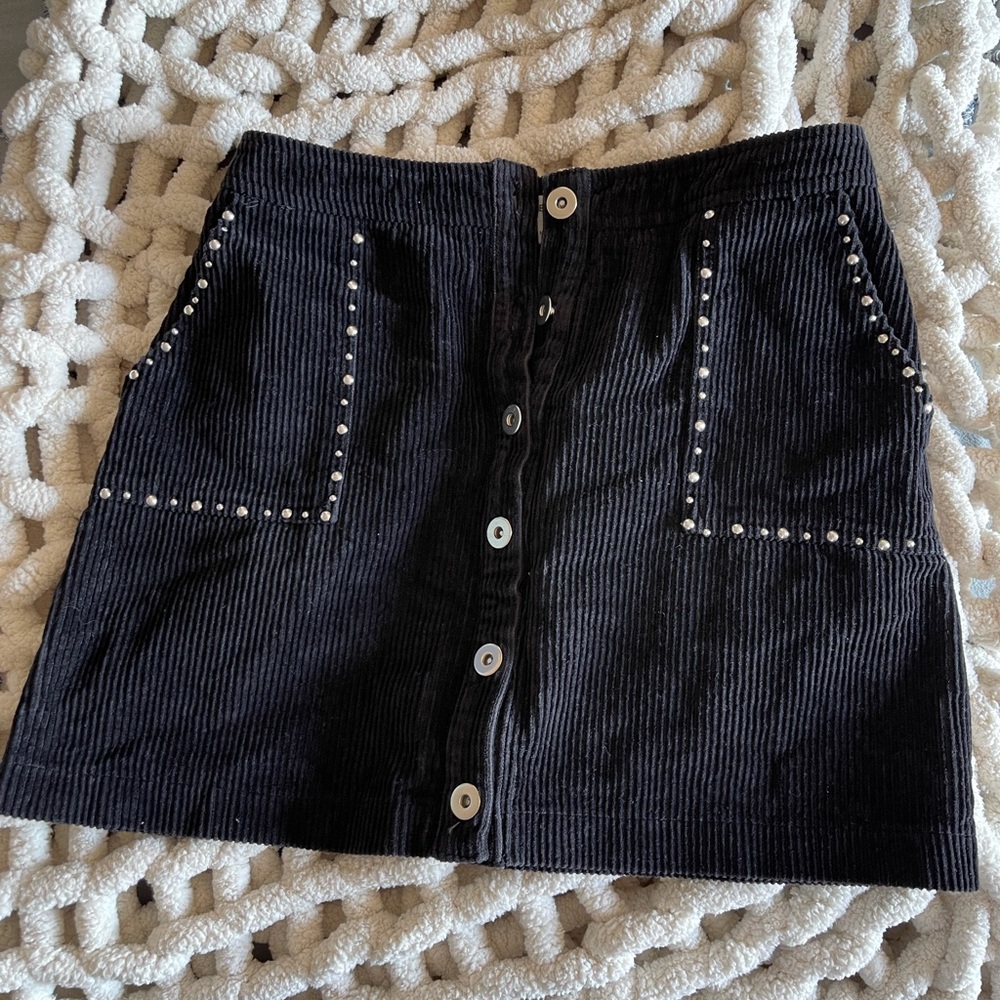 Black corduroy skirt.